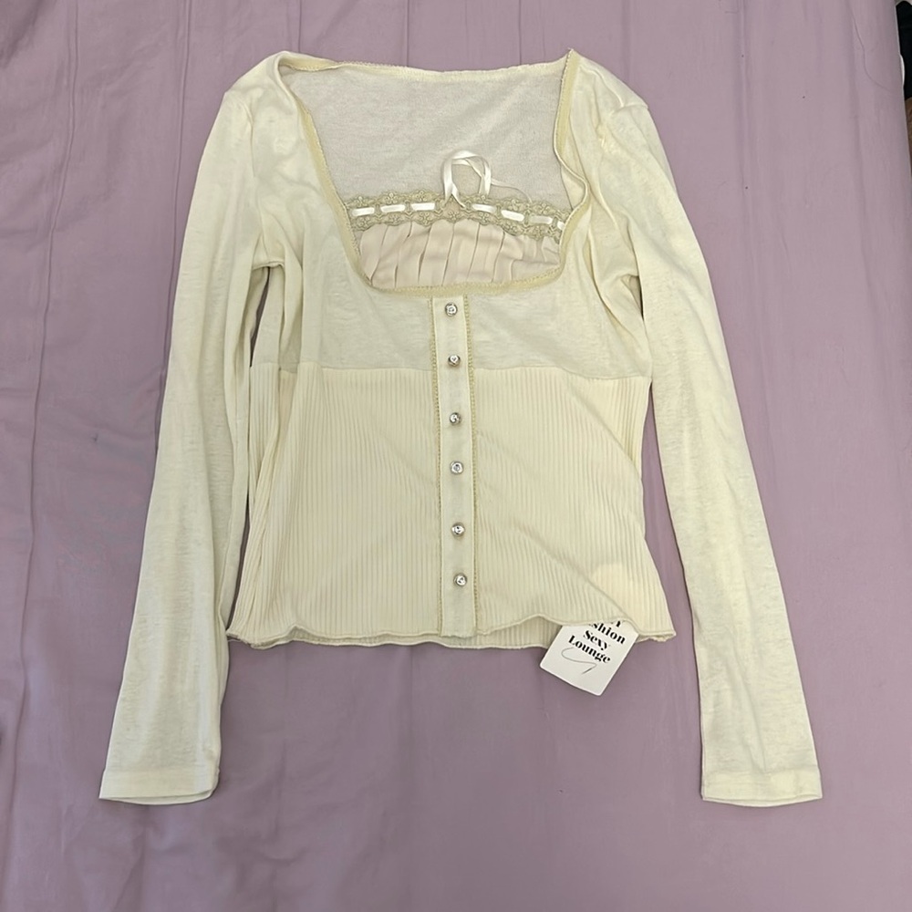 Beige long sleeved Coquette blouse/top